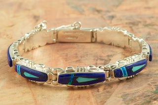 Genuine Blue Lapis and Turquoise inlaid in Sterling Silver. Stunning Bracelet Designed by Navajo Artist Calvin Begay. Signed by the artist.